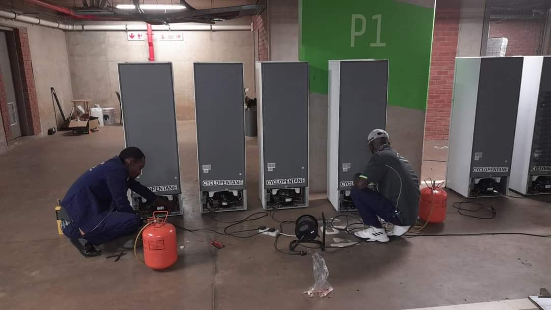 Eddie working on appliances